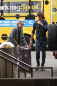 lili-reinhart-and-new-boyfriend-jack-martin-at-lax-airport-in-los-angeles-04-10-2023-2.jpg