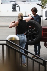 lili-reinhart-and-new-boyfriend-jack-martin-at-lax-airport-in-los-angeles-04-10-2023-4.jpg