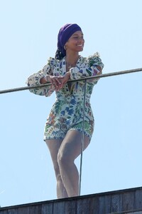 alicia-keys-wearing-a-colored-flower-print-romper-and-a-purple-headband-rio-05-03-2023-2.jpg