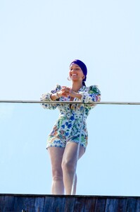 alicia-keys-wearing-a-colored-flower-print-romper-and-a-purple-headband-rio-05-03-2023-7.jpg