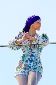 alicia-keys-wearing-a-colored-flower-print-romper-and-a-purple-headband-rio-05-03-2023-8.jpg