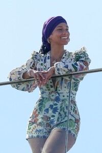 alicia-keys-wearing-a-colored-flower-print-romper-and-a-purple-headband-rio-05-03-2023-9.jpg