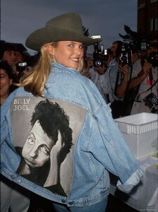 Model Christie Brinkley, Wearing Cowboy Hat, Denim Jacket with Graphic of Husband Billy Joel.jpg