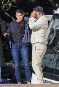 74493747-12423171-Meanwhile_her_movie_producer_boyfriend_wore_a_white_bomber_jacke-a-31_169242292383.jpg