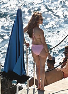jennifer-lopez-in-a-pink-swimsuit-at-a-yacht-in-positano-08-12-2023-2.jpg