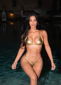 kim-kardashian-in-a-golden-bikini-at-a-photoshoot-08-14-2023-7.jpg