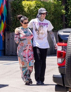 pregnant-kourtney-kardashian-and-travis-barker-cruise-in-their-barbie-inspired-classic-suv-in-calabasas-08-06-2023-5.jpg