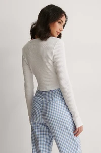 anna_briand_front_tie_detai_ribbed_cardigan_1702-000009-0001_02b.thumb.webp.46cb2406e874bc3c616e67dbf8e0399e.webp