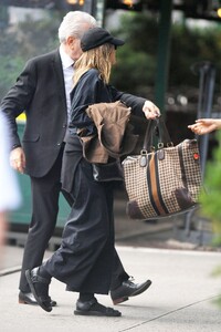 elizabeth-olsen-arrives-at-her-hotel-in-new-york-07-30-2023-4.jpg