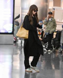 dakota-johnson-arrives-at-jfk-airport-in-new-york-11-09-2023-4.jpg