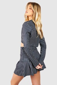 female-charcoal-crepe-pinstripe-boxy-blazer-&-pleated-mini-skirt.jpg