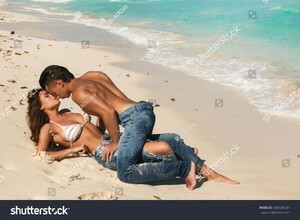 stock-photo-beautiful-couple-in-embrace-on-the-beach-444729547.jpg