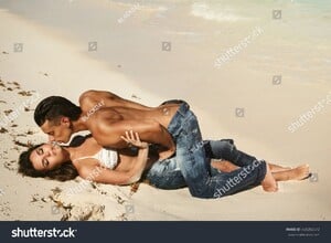 stock-photo-beautiful-couple-in-embrace-on-the-beach-480202672.jpg
