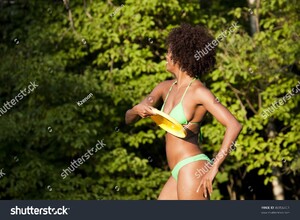 stock-photo-beautiful-woman-of-african-american-origin-throwing-a-frisbee-disc-46956451.jpg