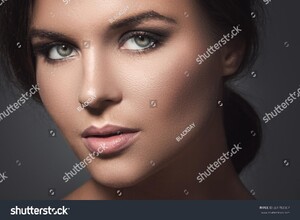 stock-photo-portrait-of-beautiful-woman-381783007.jpg