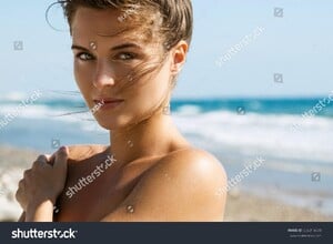 stock-photo-portrait-of-beautiful-woman-on-the-sea-556314430.jpg