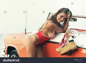 stock-photo-sexy-woman-in-red-swimsuit-and-retro-cabriolet-car-on-the-beach-654044317.jpg