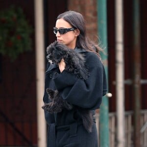 Irina-Shayk---Wearing-black-coat-with-boots-in-New-York-09.jpg