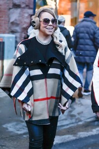 Mariah-Carey---Doing-Christmas-Shopping-with-friends-at-Prada-in-Aspen-09.jpg