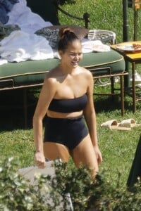 chrissy-teigen-in-swimsuit-at-a-swimming-pool-in-lake-como-09-14-2023-4.jpg