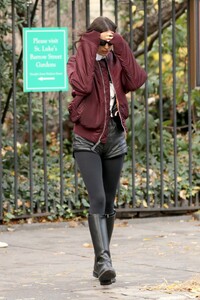 irina-shayk-in-black-leather-hot-pants-black-stockings-black-boots-and-maroon-jacket-out-in-new-york-12-04-2023-2.jpg