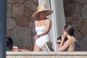 reese-witherspoon-in-a-white-swimsuit-in-cabo-san-lucas-12-26-2023-0.jpg