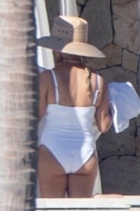 reese-witherspoon-in-a-white-swimsuit-in-cabo-san-lucas-12-26-2023-3.jpg