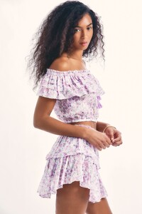 RUFFLE-MINI-SKIRT-PURPLE-IRIS-03_d94ee299-f894-47cf-be7a-8fc448470137.jpeg