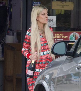tori-spelling-visits-a-liquor-store-on-new-year-s-eve-in-los-angeles-12-31-2023-3.jpg