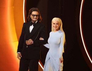 Christina-Aguilera-Stuns-as-She-Links-Arms-With-Maluma-While-Presenting-at-2024-Grammys.jpg