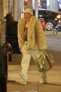 Jennifer-Lopez---In-a-fur-and-TWO-designer-bags-including-a-monogrammed-GUCCI-duffel-in-New-York-07.jpg