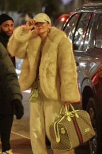 Jennifer-Lopez---In-a-fur-and-TWO-designer-bags-including-a-monogrammed-GUCCI-duffel-in-New-York-08.jpg