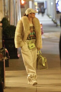 Jennifer-Lopez---In-a-fur-and-TWO-designer-bags-including-a-monogrammed-GUCCI-duffel-in-New-York-09.jpg