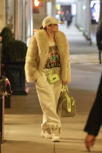 Jennifer-Lopez---In-a-fur-and-TWO-designer-bags-including-a-monogrammed-GUCCI-duffel-in-New-York-12.jpg