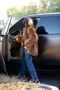 kylie-jenner-in-a-large-fur-and-jeans-exits-a-calabasas-office-building-02-14-2024-6.jpg