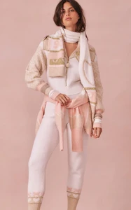 LoveShackFancy-R23-CTSY-46a large_love-shack-fancy-neutral-lali-knit-jumpsuit2.webp