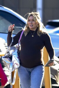 hilary-duff-in-a-brown-form-fitting-sweater-in-los-angeles-02-21-2024-6.jpg