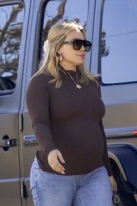 hilary-duff-in-a-brown-form-fitting-sweater-in-los-angeles-02-21-2024-7.jpg