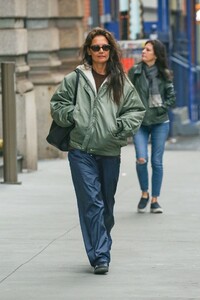 katie-holmes-in-a-green-olive-rain-jacket-and-navy-blue-rain-pants-in-nyc-02-27-2024-4.jpg