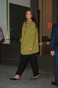 katie-holmes-in-a-long-olive-green-jacket-black-pants-and-black-heels-03-20-2024-1.jpg