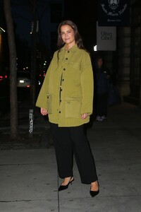 katie-holmes-in-a-long-olive-green-jacket-black-pants-and-black-heels-03-20-2024-6.jpg