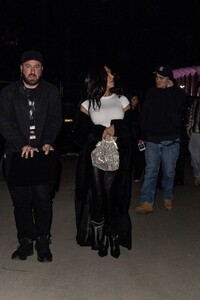 kim-kardashian-departs-from-kanye-west-s-electrifying-vultures-2-performance-at-sofi-stadium-in-los-angeles-03-14-2024-4.jpg