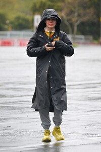 rachel-bilson-wearing-an-oversized-rain-coat-and-a-striped-sweater-in-pasadena-03-23-2024-1.jpg