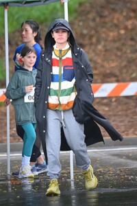 rachel-bilson-wearing-an-oversized-rain-coat-and-a-striped-sweater-in-pasadena-03-23-2024-4.jpg