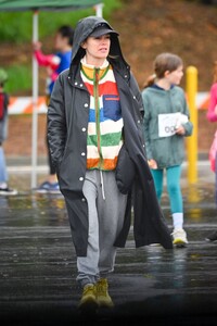 rachel-bilson-wearing-an-oversized-rain-coat-and-a-striped-sweater-in-pasadena-03-23-2024-5.jpg