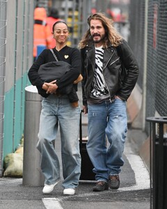 zoe-saldana-arriving-at-jfk-airport-in-new-york-03-27-2024-2.jpg