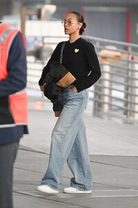 zoe-saldana-arriving-at-jfk-airport-in-new-york-03-27-2024-5.jpg