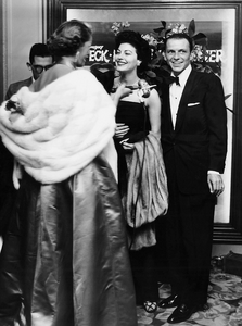 Frank Sinatra and Ava Gardner being interviewed at the premiere of her film The Snows of Kilimanjaro, 1952.png