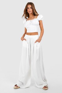 female-black-poplin-puff-shoulder-crop-top.jpg