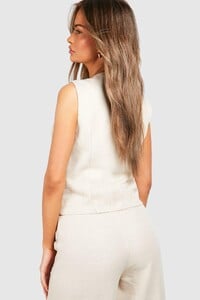 female-natural beige-textured-contour-seam-waistcoat.jpg